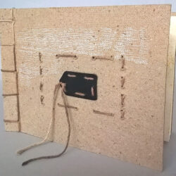 Broken Hearts, (outside) 2014, 5 x 12.5 x 7", board, paper, hemp cord, plastic