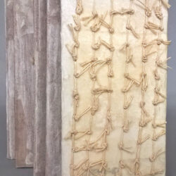 Haptic III, (outside/front cover) 2016, 6.75 x 3.5 x 18.5", board, paper, cloth, bead, ribbon, raffia, hemp cord