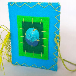 Blue, (outside) 2016, 6.25 x 10.25 x 5", board, felt, paper, clay, paint, hemp cord, raffia