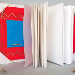 Red, (inside) 2016, 6.25 x 10 x 5", board, felt, paper, clay, paint, hemp cord, beads