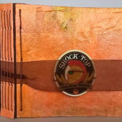 SHOCK TOP, (outside) 2015, 5.75 x 12.25 x 6", board, paper, felt, hemp cord, ribbon, plastic