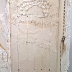 Like White on White, 2015, 7.5 x 14 x 6", board, cloth, paper, lace, zipper, paper, linen thread