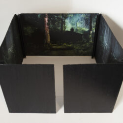 In The Woods, (front view), collaboration with Michelle Robinson. 2025, 12" x 20" x 20", Artists' Book: book board, assorted paper/s, hemp cord, archival inks